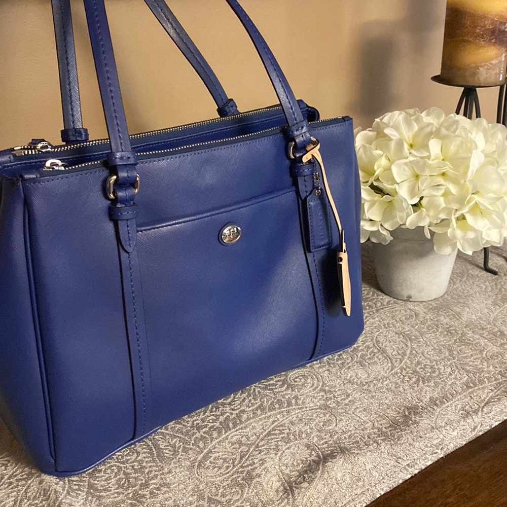 Bright blue structures coach purse